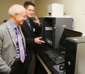 Christopher Mirabelli and Scott Ferguson in biology lab